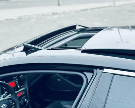 Черный Киа Оптима, объемом двигателя 2.36 л и пробегом 210 тыс. км за 9900 $, фото 14 на Automoto.ua