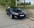 Черный Киа Оптима, объемом двигателя 2 л и пробегом 170 тыс. км за 8600 $, фото 1 на Automoto.ua