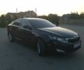 Черный Киа Оптима, объемом двигателя 2 л и пробегом 207 тыс. км за 9500 $, фото 1 на Automoto.ua