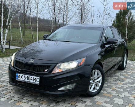 Черный Киа Оптима, объемом двигателя 2.36 л и пробегом 201 тыс. км за 7600 $, фото 1 на Automoto.ua