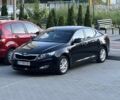 Черный Киа Оптима, объемом двигателя 2 л и пробегом 138 тыс. км за 9100 $, фото 1 на Automoto.ua