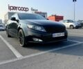 Черный Киа Оптима, объемом двигателя 2 л и пробегом 223 тыс. км за 6200 $, фото 1 на Automoto.ua
