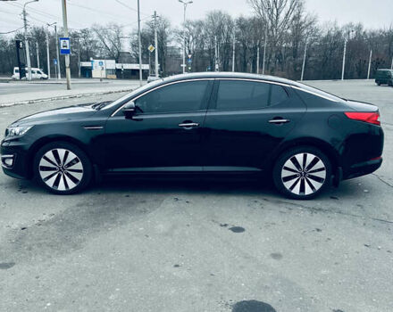 Черный Киа Оптима, объемом двигателя 2.36 л и пробегом 210 тыс. км за 9900 $, фото 7 на Automoto.ua