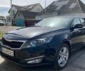 Черный Киа Оптима, объемом двигателя 2 л и пробегом 186 тыс. км за 11500 $, фото 1 на Automoto.ua
