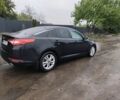 Черный Киа Оптима, объемом двигателя 2 л и пробегом 260 тыс. км за 9000 $, фото 1 на Automoto.ua