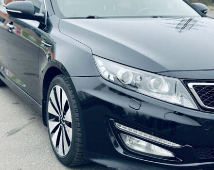 Черный Киа Оптима, объемом двигателя 2.36 л и пробегом 210 тыс. км за 9900 $, фото 2 на Automoto.ua