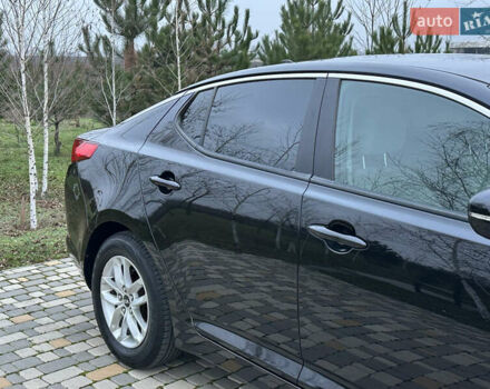 Черный Киа Оптима, объемом двигателя 2.36 л и пробегом 201 тыс. км за 7600 $, фото 22 на Automoto.ua