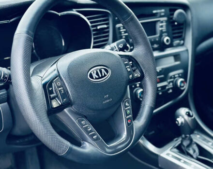 Черный Киа Оптима, объемом двигателя 2.36 л и пробегом 210 тыс. км за 9900 $, фото 12 на Automoto.ua