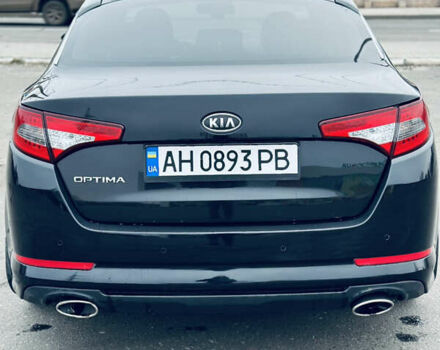 Черный Киа Оптима, объемом двигателя 2.36 л и пробегом 210 тыс. км за 9900 $, фото 5 на Automoto.ua