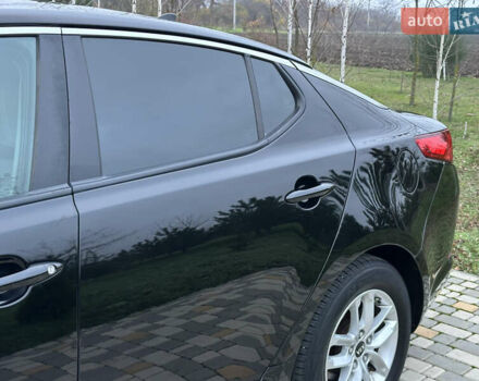 Черный Киа Оптима, объемом двигателя 2.36 л и пробегом 201 тыс. км за 7600 $, фото 18 на Automoto.ua