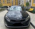 Черный Киа Оптима, объемом двигателя 2.4 л и пробегом 227 тыс. км за 8500 $, фото 1 на Automoto.ua