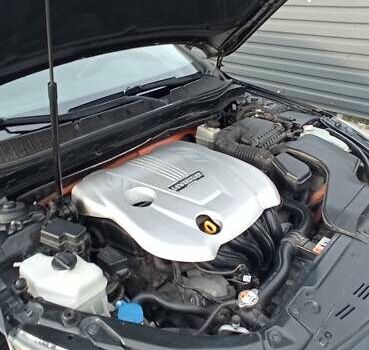 Черный Киа Оптима, объемом двигателя 2.36 л и пробегом 136 тыс. км за 10400 $, фото 17 на Automoto.ua