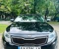 Черный Киа Оптима, объемом двигателя 2.4 л и пробегом 200 тыс. км за 9000 $, фото 1 на Automoto.ua