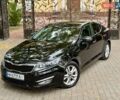 Черный Киа Оптима, объемом двигателя 2 л и пробегом 183 тыс. км за 9800 $, фото 1 на Automoto.ua