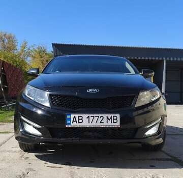 Черный Киа Оптима, объемом двигателя 1.69 л и пробегом 306 тыс. км за 8950 $, фото 8 на Automoto.ua