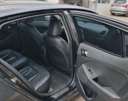 Чорний Кіа Оптіма, об'ємом двигуна 2 л та пробігом 312 тис. км за 9200 $, фото 3 на Automoto.ua