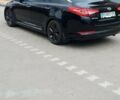 Черный Киа Оптима, объемом двигателя 2.36 л и пробегом 136 тыс. км за 10400 $, фото 13 на Automoto.ua