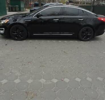 Черный Киа Оптима, объемом двигателя 2.36 л и пробегом 136 тыс. км за 10400 $, фото 6 на Automoto.ua