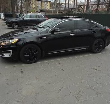 Черный Киа Оптима, объемом двигателя 2.36 л и пробегом 136 тыс. км за 10400 $, фото 8 на Automoto.ua