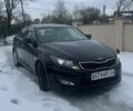 Черный Киа Оптима, объемом двигателя 2.36 л и пробегом 114 тыс. км за 8000 $, фото 1 на Automoto.ua