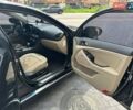 Черный Киа Оптима, объемом двигателя 2.36 л и пробегом 273 тыс. км за 10000 $, фото 7 на Automoto.ua