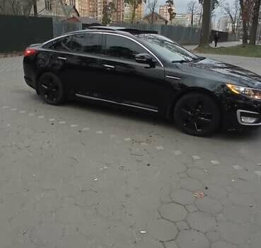 Черный Киа Оптима, объемом двигателя 2.36 л и пробегом 136 тыс. км за 10400 $, фото 4 на Automoto.ua