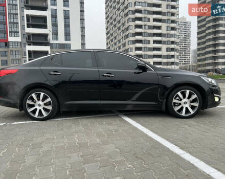 Черный Киа Оптима, объемом двигателя 2 л и пробегом 185 тыс. км за 10200 $, фото 1 на Automoto.ua