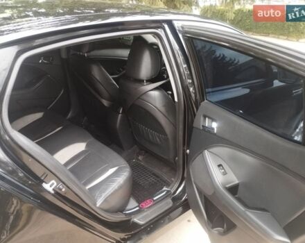 Чорний Кіа Оптіма, об'ємом двигуна 1.69 л та пробігом 321 тис. км за 9700 $, фото 14 на Automoto.ua