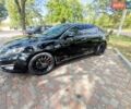 Чорний Кіа Оптіма, об'ємом двигуна 2 л та пробігом 256 тис. км за 8400 $, фото 1 на Automoto.ua