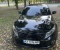 Черный Киа Оптима, объемом двигателя 2.4 л и пробегом 217 тыс. км за 9000 $, фото 1 на Automoto.ua