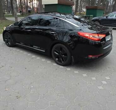 Черный Киа Оптима, объемом двигателя 2.36 л и пробегом 136 тыс. км за 10400 $, фото 9 на Automoto.ua