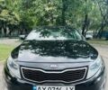 Черный Киа Оптима, объемом двигателя 2.4 л и пробегом 200 тыс. км за 9700 $, фото 1 на Automoto.ua