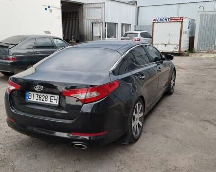 Чорний Кіа Оптіма, об'ємом двигуна 2 л та пробігом 312 тис. км за 9200 $, фото 1 на Automoto.ua