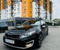 Чорний Кіа Оптіма, об'ємом двигуна 2.36 л та пробігом 223 тис. км за 9600 $, фото 1 на Automoto.ua