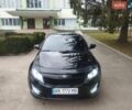 Чорний Кіа Оптіма, об'ємом двигуна 1.69 л та пробігом 325 тис. км за 8200 $, фото 1 на Automoto.ua