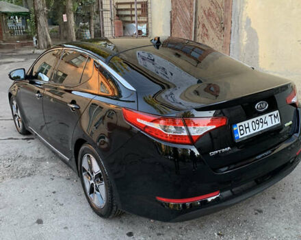 Чорний Кіа Оптіма, об'ємом двигуна 2.4 л та пробігом 289 тис. км за 11000 $, фото 3 на Automoto.ua