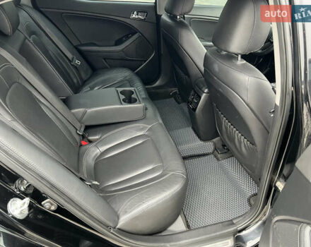 Черный Киа Оптима, объемом двигателя 2 л и пробегом 185 тыс. км за 10200 $, фото 14 на Automoto.ua