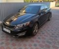 Чорний Кіа Оптіма, об'ємом двигуна 2 л та пробігом 123 тис. км за 9500 $, фото 1 на Automoto.ua