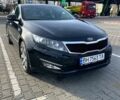 Чорний Кіа Оптіма, об'ємом двигуна 2 л та пробігом 169 тис. км за 10380 $, фото 2 на Automoto.ua