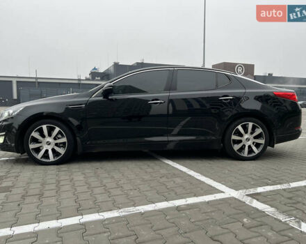 Черный Киа Оптима, объемом двигателя 2 л и пробегом 185 тыс. км за 10200 $, фото 3 на Automoto.ua