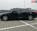 Черный Киа Оптима, объемом двигателя 2 л и пробегом 185 тыс. км за 10200 $, фото 3 на Automoto.ua