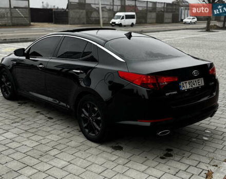 Чорний Кіа Оптіма, об'ємом двигуна 2.36 л та пробігом 206 тис. км за 6850 $, фото 22 на Automoto.ua