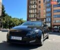 Черный Киа Оптима, объемом двигателя 2.36 л и пробегом 225 тыс. км за 9600 $, фото 1 на Automoto.ua