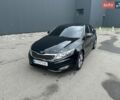 Черный Киа Оптима, объемом двигателя 2.36 л и пробегом 260 тыс. км за 9000 $, фото 1 на Automoto.ua