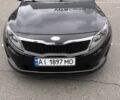 Черный Киа Оптима, объемом двигателя 2 л и пробегом 350 тыс. км за 9000 $, фото 1 на Automoto.ua