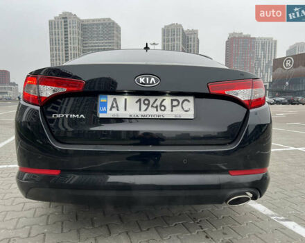 Черный Киа Оптима, объемом двигателя 2 л и пробегом 185 тыс. км за 10200 $, фото 2 на Automoto.ua
