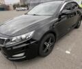 Черный Киа Оптима, объемом двигателя 2 л и пробегом 350 тыс. км за 9000 $, фото 1 на Automoto.ua