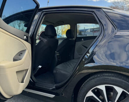 Черный Киа Оптима, объемом двигателя 2.36 л и пробегом 210 тыс. км за 10500 $, фото 8 на Automoto.ua