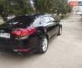Чорний Кіа Оптіма, об'ємом двигуна 1.69 л та пробігом 321 тис. км за 9700 $, фото 4 на Automoto.ua