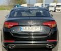 Чорний Кіа Оптіма, об'ємом двигуна 2 л та пробігом 378 тис. км за 6687 $, фото 4 на Automoto.ua